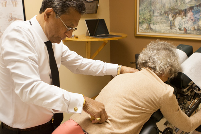 Dr. JangDhari treating a patient